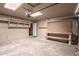 Open garage with workbench, pegboard, and ample storage space for all your needs at 7849 E Golf Ave, Mesa, AZ 85209