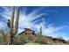 Scenic desert landscape featuring native cacti, foliage, and rock formations at 8209 S 23Rd Pl, Phoenix, AZ 85042