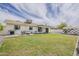Expansive backyard with patio, mature landscaping, and a cozy outdoor seating area at 8320 E Monte Vista Rd, Scottsdale, AZ 85257