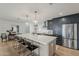 This spacious kitchen features a large center island, stainless steel appliances, and modern cabinetry at 8320 E Monte Vista Rd, Scottsdale, AZ 85257