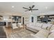 Spacious open-concept living room flowing into the dining area and kitchen at 8320 E Monte Vista Rd, Scottsdale, AZ 85257