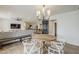 Bright, open floor plan with seamless transitions between the dining area, kitchen, and living room for modern living at 8320 E Monte Vista Rd, Scottsdale, AZ 85257