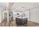 Bright kitchen with white cabinets, stainless appliances, and a striking dark island at 8326 E Crestwood Way, Scottsdale, AZ 85250