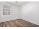 This bedroom features a window with blinds and neutral colored walls at 8541 W Malapai Dr, Peoria, AZ 85345