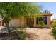 Charming single-story home with well-maintained front yard, garage, and desert landscaping at 8541 W Malapai Dr, Peoria, AZ 85345
