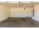 Clean, oversized two-car garage with ample space for parking and storage at 8541 W Malapai Dr, Peoria, AZ 85345
