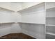 Spacious walk-in closet with ample shelving and hanging space, ready for organization at 8541 W Malapai Dr, Peoria, AZ 85345