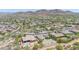 Expansive aerial view of a desert neighborhood with mountain views at 9225 W Bajada Rd, Peoria, AZ 85383