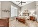 Bedroom with a bed, bedside tables, and a window with blinds at 9225 W Bajada Rd, Peoria, AZ 85383