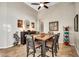Open dining area with table, seating, decor, tile flooring, and lighting fixtures at 9225 W Bajada Rd, Peoria, AZ 85383