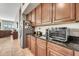 Kitchen area with stainless steel appliances and granite countertops with plenty of storage at 9225 W Bajada Rd, Peoria, AZ 85383