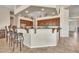 Open kitchen with dark cabinetry, granite countertops, barstool seating, and recessed lighting at 9225 W Bajada Rd, Peoria, AZ 85383