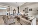 Inviting living room with neutral tones, comfortable seating, and stylish decor accents for a relaxing atmosphere at 9225 W Bajada Rd, Peoria, AZ 85383