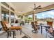 Comfortable covered patio featuring stylish seating and a view of the beautifully landscaped backyard at 9225 W Bajada Rd, Peoria, AZ 85383