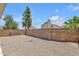 Large gravel backyard with block wall providing privacy at 9601 S 44Th St, Phoenix, AZ 85044