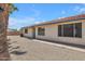 Exterior of a single story home showcasing desert landscaping with a red tile roof at 9601 S 44Th St, Phoenix, AZ 85044