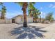Single Gathering home with desert landscaping, including a large palm tree in the front yard at 9601 S 44Th St, Phoenix, AZ 85044