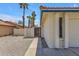 Close up of entrance to the home's front yard, featuring desert landscaping and concrete walkway at 9601 S 44Th St, Phoenix, AZ 85044
