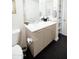 Well lit bathroom with modern vanity, updated fixtures and plenty of storage at 1 E Lexington Ave # 1306, Phoenix, AZ 85012