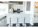 Open kitchen with bar seating and modern appliances, great for entertaining at 1 E Lexington Ave # 1306, Phoenix, AZ 85012
