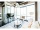 Contemporary living area with modern furnishings and a scenic city view at 1 E Lexington Ave # 1306, Phoenix, AZ 85012