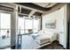 Bright living room with floor-to-ceiling windows and sleek, modern decor at 1 E Lexington Ave # 1306, Phoenix, AZ 85012
