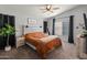 Comfortable bedroom with ceiling fan, gray walls, and nice decor creates a relaxing atmosphere at 10226 N 93Rd Dr, Peoria, AZ 85345
