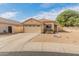 Charming single-story home with a well-maintained front yard and two-car garage at 10226 N 93Rd Dr, Peoria, AZ 85345