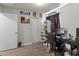 The office features a computer desk with a monitor, a rolling chair, and storage shelves at 10226 N 93Rd Dr, Peoria, AZ 85345