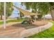 Community playground with shaded play area, slides, and climbing structures for enjoyment at 10226 N 93Rd Dr, Peoria, AZ 85345
