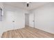 Bright bedroom with wood-look flooring, a window and large closet for ample storage at 11025 E Cholla Rd, Mesa, AZ 85207