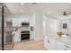 Stylish kitchen with white cabinetry, stainless appliances and stone countertops at 11025 E Cholla Rd, Mesa, AZ 85207