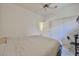 Bedroom featuring a ceiling fan and closet with white doors at 11038 W Oraibi Dr, Peoria, AZ 85373