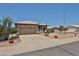 Charming home with desert landscaping and a convenient two-car garage at 11038 W Oraibi Dr, Peoria, AZ 85373