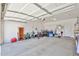 Spacious two-car garage with ample storage and a clean, organized layout at 11038 W Oraibi Dr, Peoria, AZ 85373