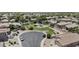 Aerial view of a Gathering-friendly neighborhood featuring cul-de-sacs, a playground, and lush green spaces at 1162 E Ranch Ct, Gilbert, AZ 85296