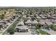 An aerial view of the neighborhood highlighting well-maintained homes, landscaping, and a nearby golf course at 1162 E Ranch Ct, Gilbert, AZ 85296