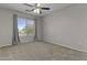 Bright bedroom with neutral carpet and window with curtains offers a relaxing retreat at 1162 E Ranch Ct, Gilbert, AZ 85296