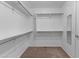 Walk-in closet featuring built-in shelving and clothing rods at 1162 E Ranch Ct, Gilbert, AZ 85296