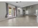 Open living space with tile floors, French doors, open shelving and modern fixtures at 1162 E Ranch Ct, Gilbert, AZ 85296