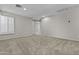 Expansive loft area with neutral carpet and shuttered windows offers versatile space for various activities at 1162 E Ranch Ct, Gilbert, AZ 85296