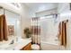 Well-maintained bathroom with a shower-tub combination and modern vanity at 12318 W Bloomfield Rd, El Mirage, AZ 85335