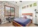 Fun bedroom with superhero themed decor, ceiling fan, and natural light at 1247 E Bautista Rd, Gilbert, AZ 85297