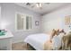 Comfortable bedroom with a large window and light purple walls at 1247 E Bautista Rd, Gilbert, AZ 85297
