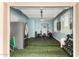 Garage space with fitness equipment and a stainless steel refrigerator at 1247 E Bautista Rd, Gilbert, AZ 85297
