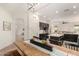 Open concept kitchen with island, stainless appliances, and modern lighting at 1247 E Bautista Rd, Gilbert, AZ 85297