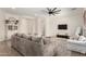 Bright and airy living room features an open layout, stylish furniture, and recessed lighting at 1247 E Bautista Rd, Gilbert, AZ 85297
