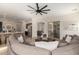 Bright living room offering an open floor plan with access to the kitchen at 1247 E Bautista Rd, Gilbert, AZ 85297