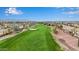 Stunning aerial view of the golf course community, highlighting the lush fairways and beautiful homes at 13219 W Santa Ynez Dr, Sun City West, AZ 85375