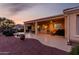 Backyard patio with seating and landscaped yard at 13219 W Santa Ynez Dr, Sun City West, AZ 85375